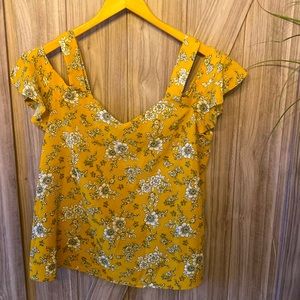 Off shoulder blouse, floral print on mustard.